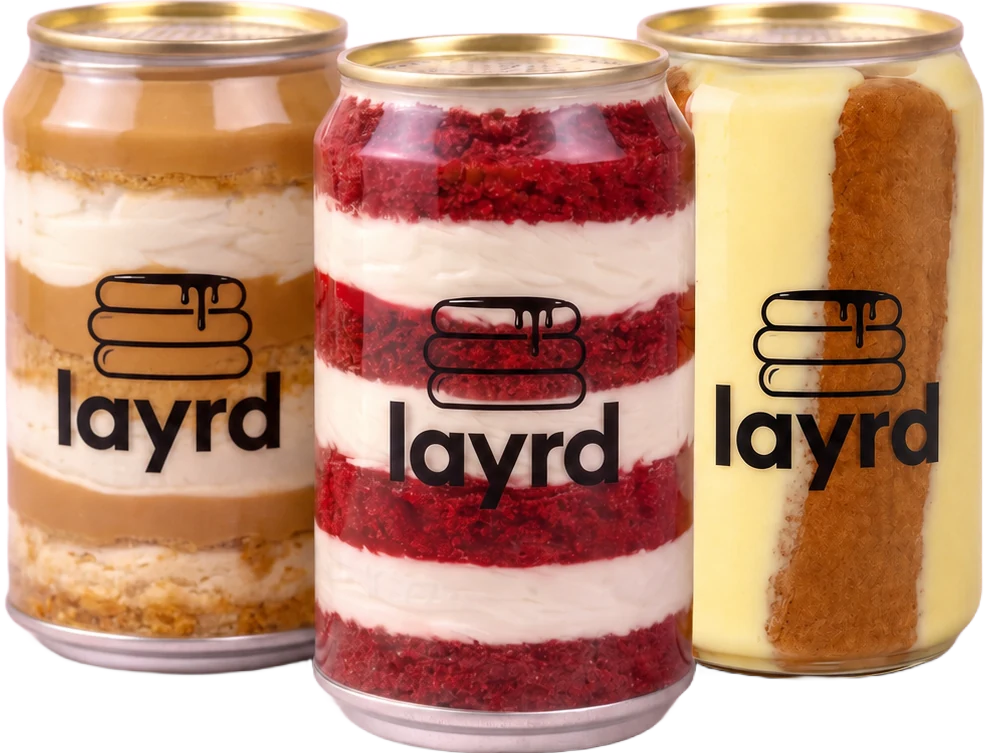 Three handmade Layrd dessert cans, layered and ready to eat.